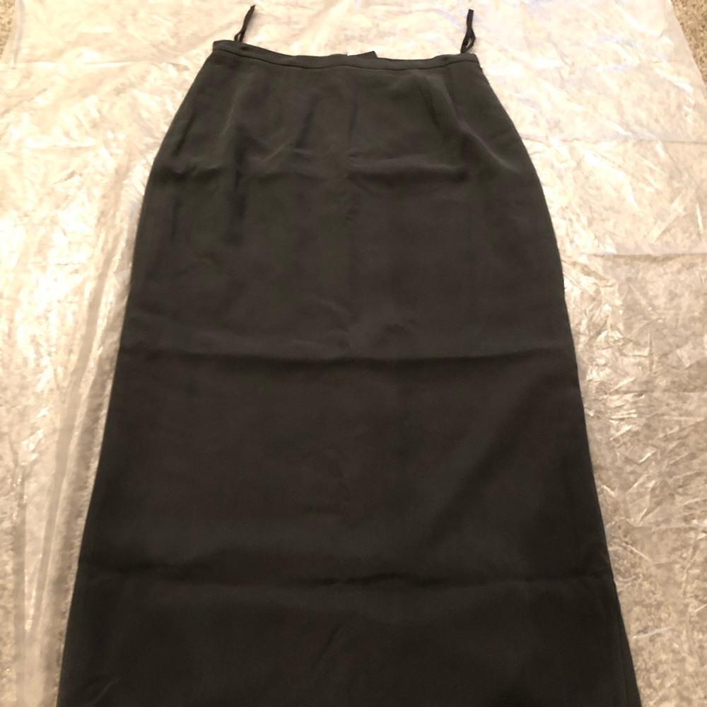 dark blue 100 % silk A - line skirt size 4 lining is 100% acetate dry clean only